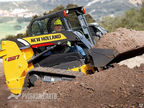 Фото Мини-погрузчики New Holland C227 (гусеничный)