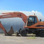 фото Экскаватор Doosan 210