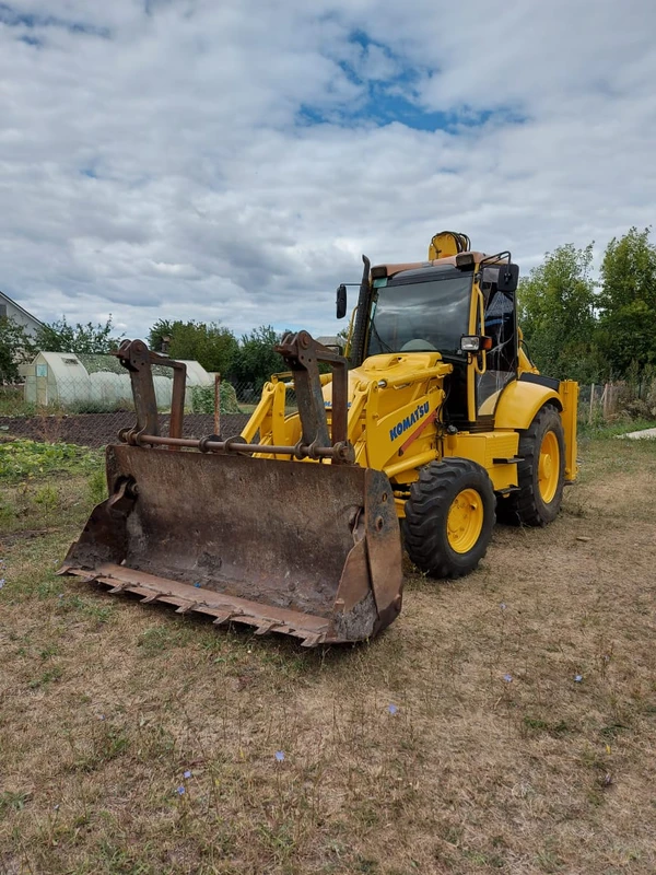 Фото Экскаватор погрузчик KOMATSU