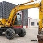 фото Аренда экскаватора JCB JS 130W, с использованием ковша