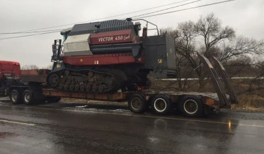 Фото Услуги перевозки спецтехники