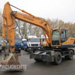 фото Экскаватор колесный HYUNDAI R180W-9S (2013г.)