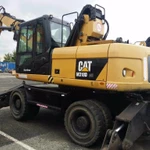 фото Аренда колёсного экскаватора Caterpillar M318D