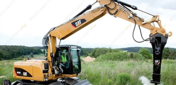 Фото Аренда колесного экскаватора Caterpillar M318, Москва