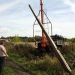 фото Установка железобетонных опор СВ, деревянных столбов на Ж/Б приставках