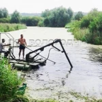 фото Земснаряд для очистки водоёмов в Вологде