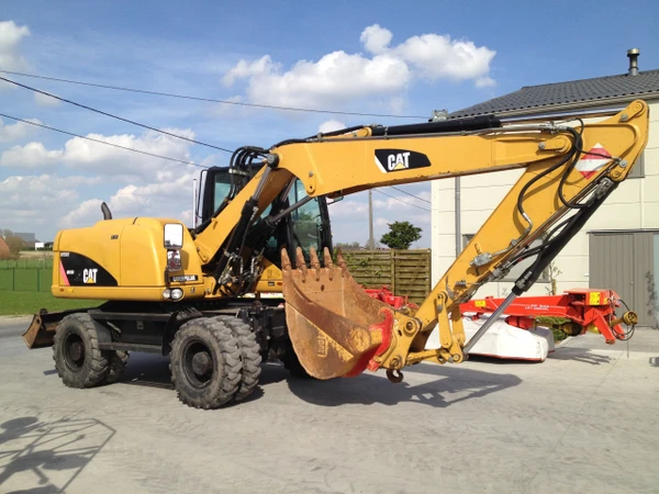 Фото Аренда колёсного экскаватора Caterpillar M313D