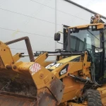 фото Аренда экскаватора-погрузчика Caterpillar 428E, Москва