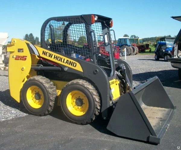 Фото Мини-погрузчик New Holland L215 Италия