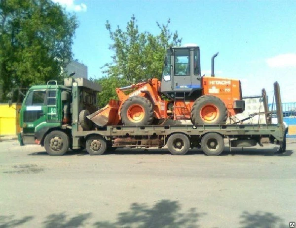 Фото Услуги эвакуатора для спецтехники