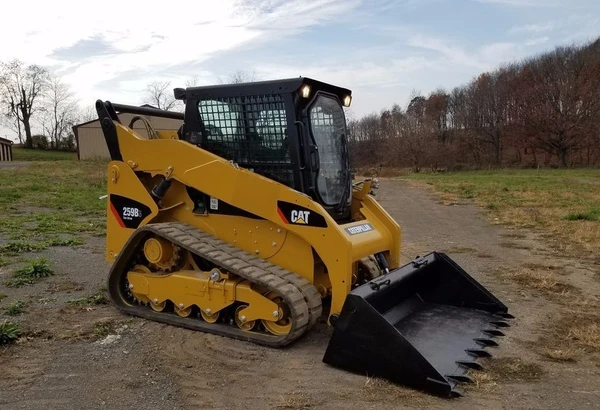 Фото Мини-погрузчик гусеничный CAT 259B Caterpillar фронтальный с бортовым поворотом